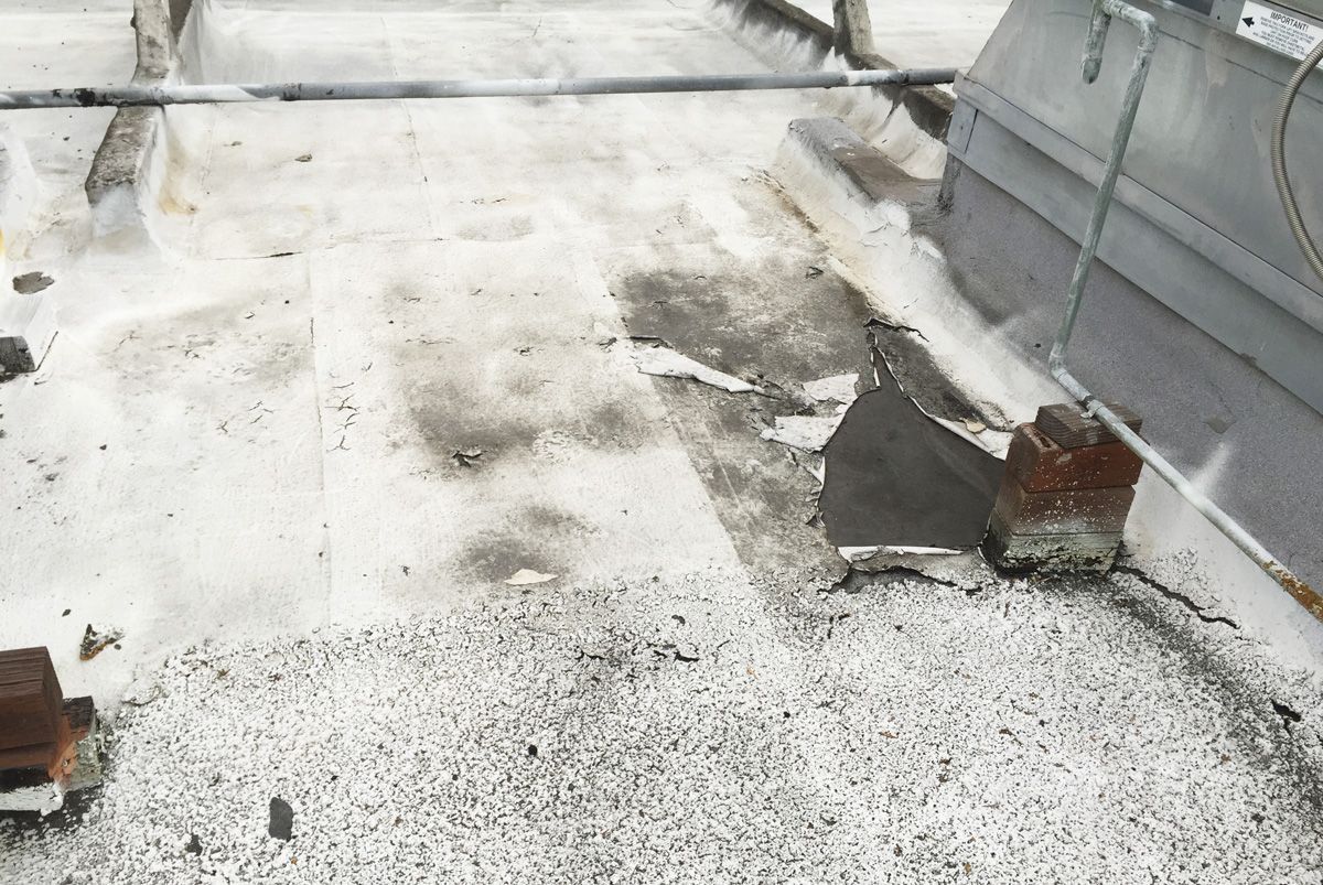 A close up of a roof with a lot of dust on it.