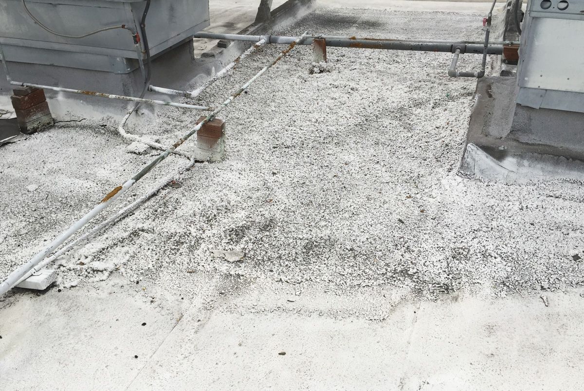 A close up of a roof with a lot of dust on it.