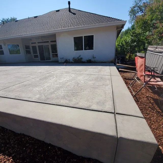 Concrete area next to folding chair — Yuba City, CA — Superior Concrete Flatwork/HSCP