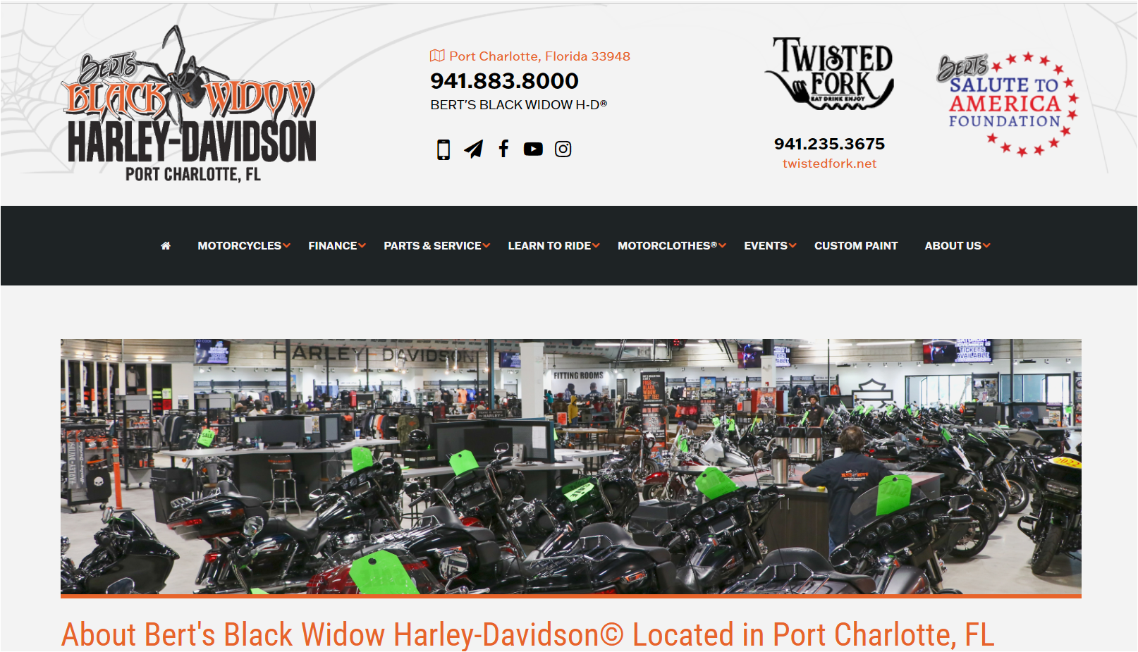 Bert's Black Widow Harley-Davidson in Port Charlotte, FL. Dealership interior with rows of motorcycles.