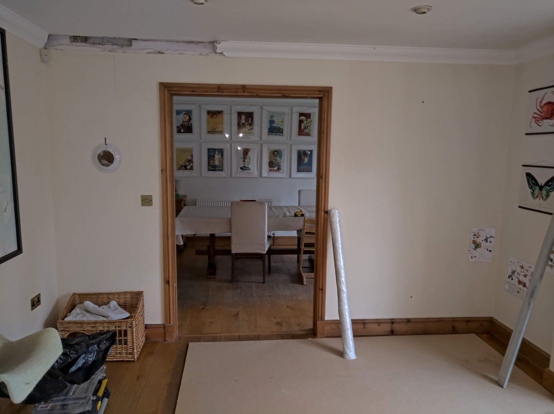 A living room with a doorway leading to a dining room.