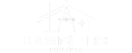 A white logo with a compass and a cross on a white background.