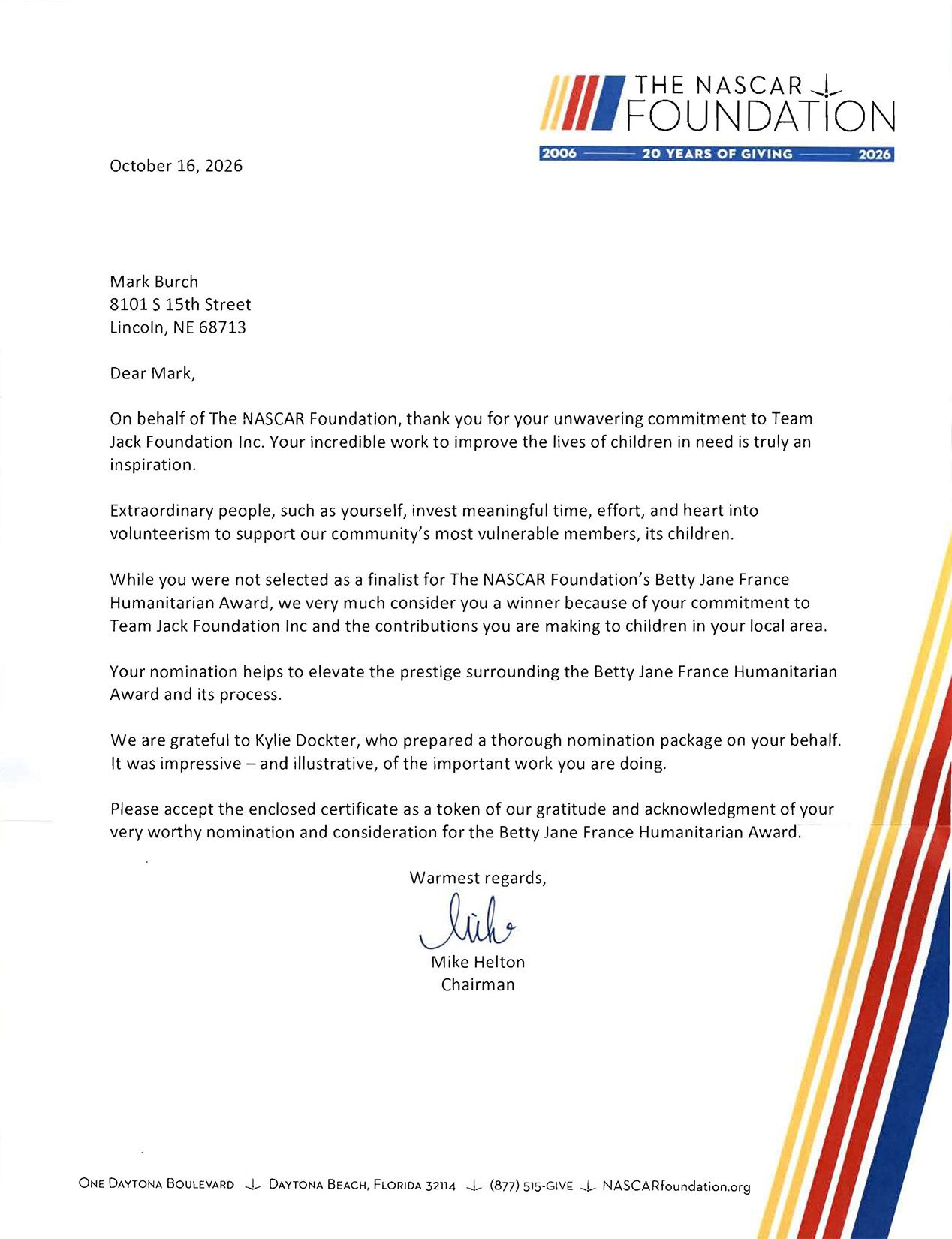 Nasdaq Foundation letterhead with a typed thank-you letter on white paper, accented by red and yellow stripes