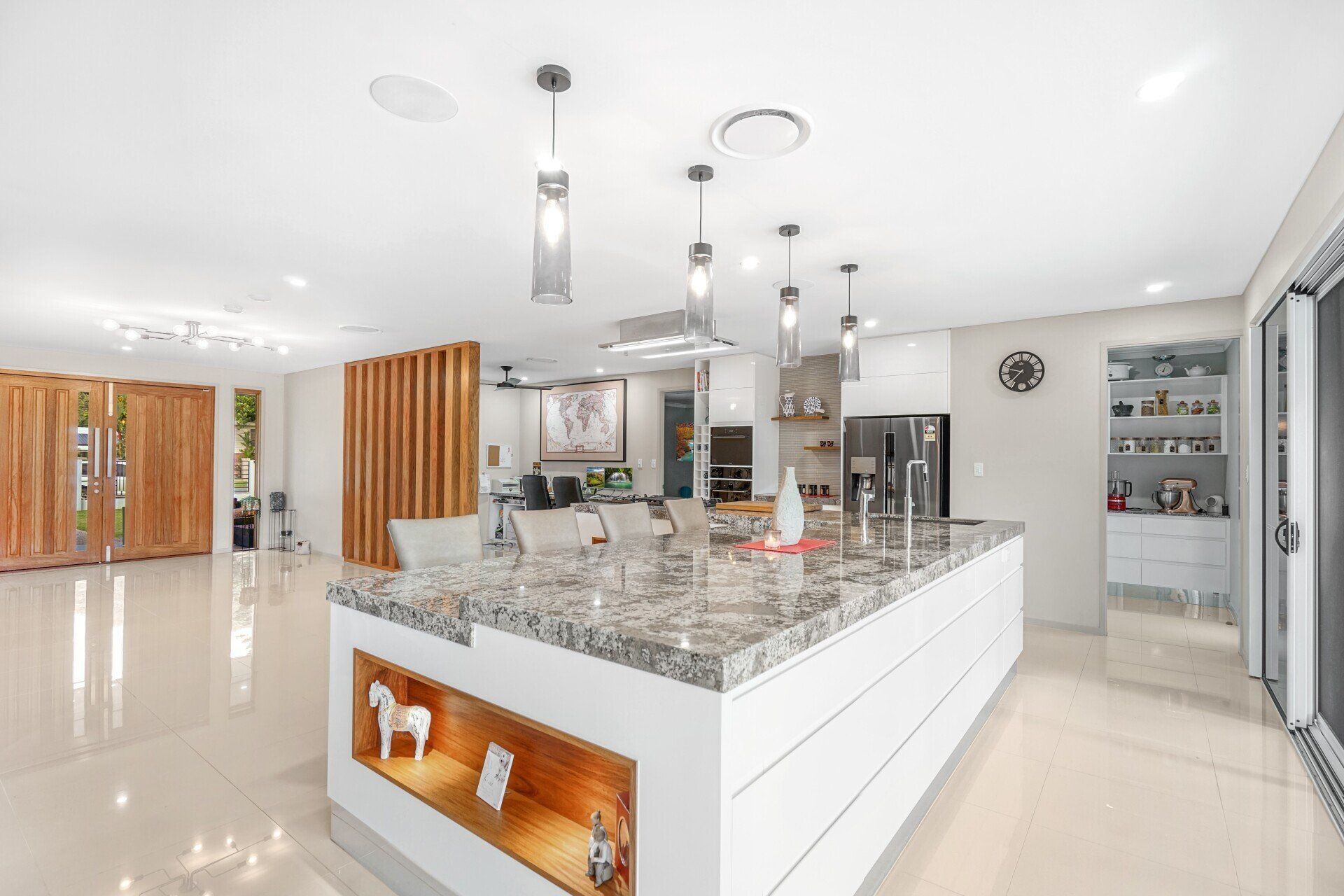 White Kitchen With Big Window — Kitchen Design in Edmonton, QLD