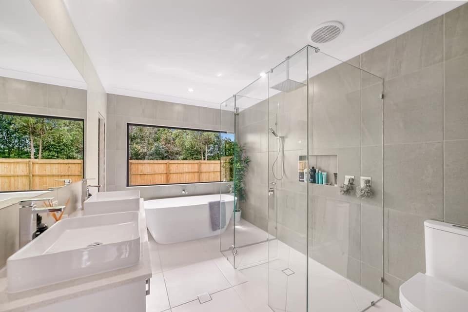 Stylish Vessel Sink On Light Countertop In Modern Bathroom — Kitchen Design in Edmonton, QLD