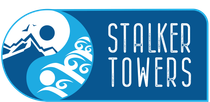 Blue and white “Stalker Towers” logo with stylized mountains, waves, and sun icon