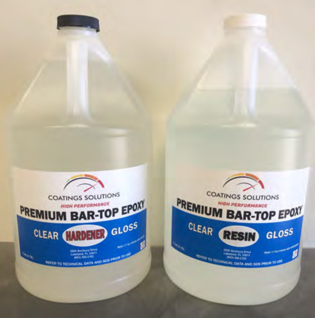 Two clear resin bottles labeled "Premium Bar-Top Epoxy" and "CLEAR RESIN".
