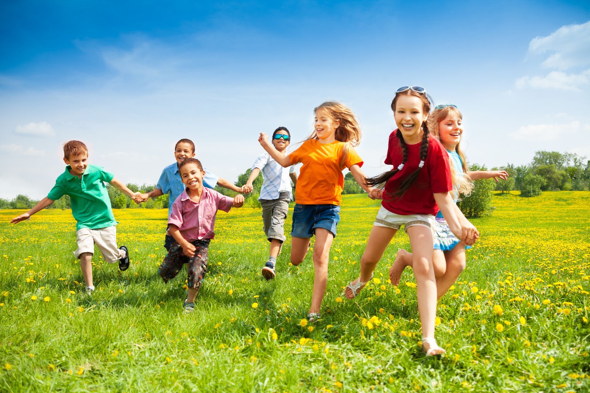 Kids Running on Grass Field