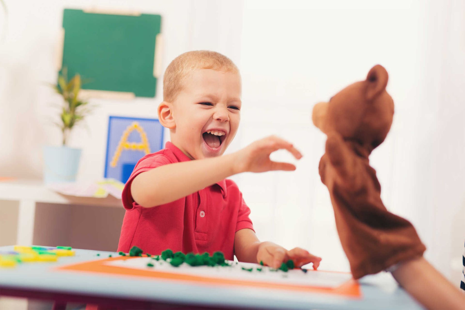 Child Playing With His Teacher