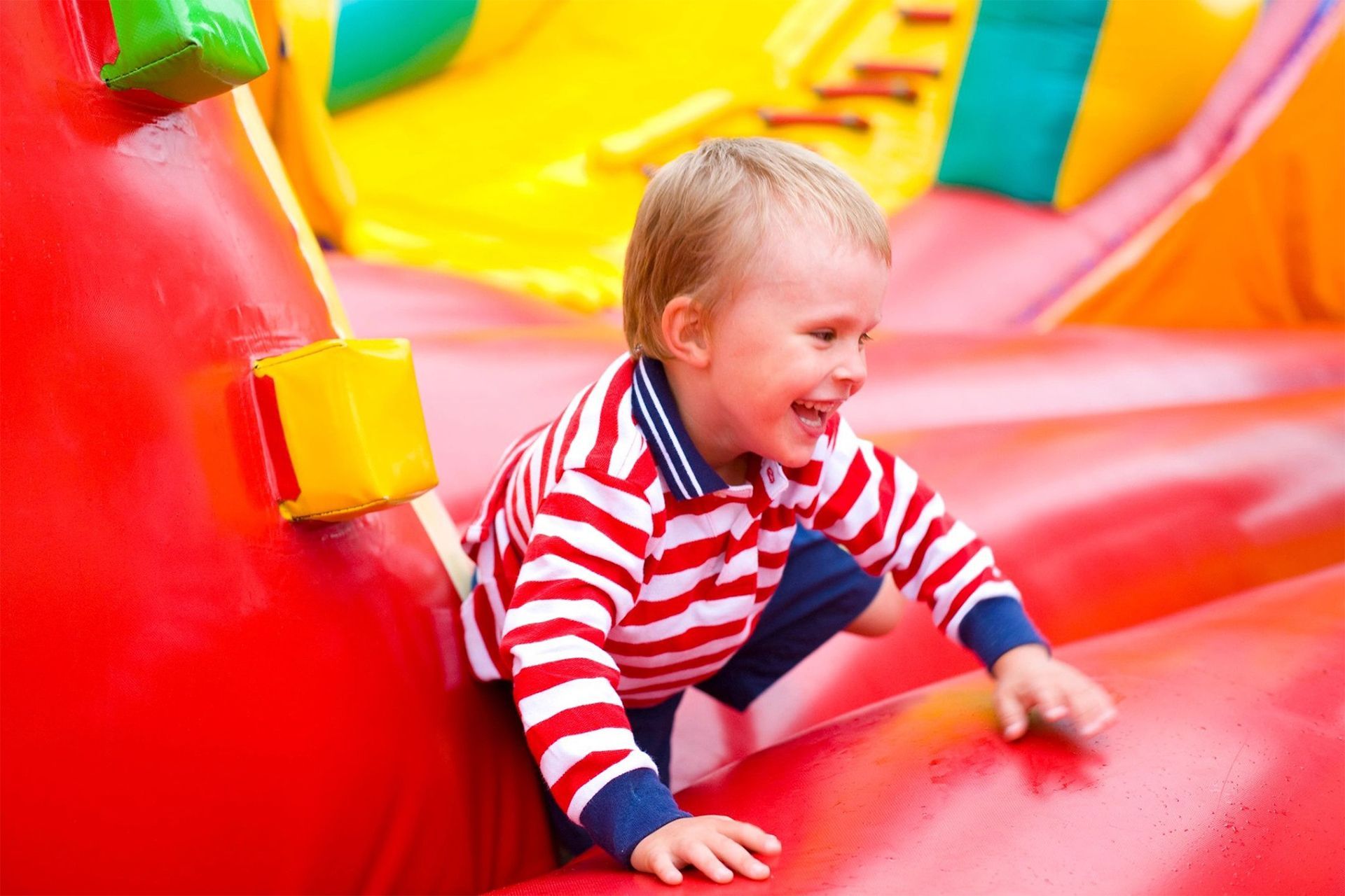 Toddler Playing on Inflatables