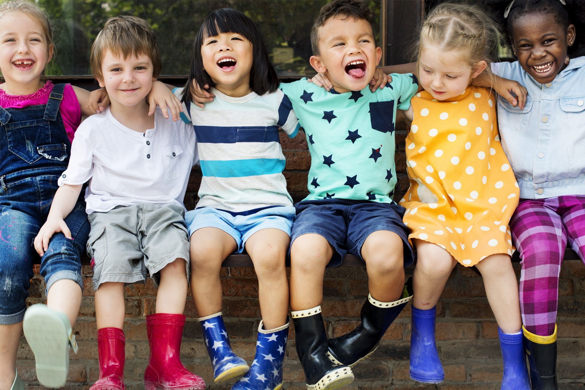 Happy Kids Wearing Boots Happy Kids Wearing Boots