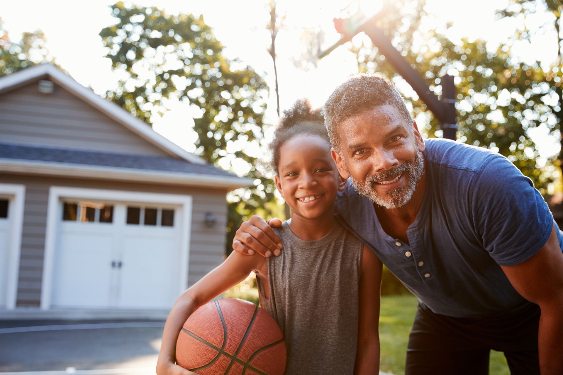 Father and Son Playing Basketball