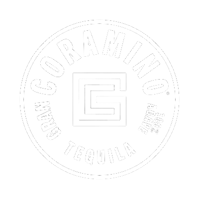 Black-and-white circular Corramino Tequila logo with centered geometric “G” mark and “100% Agave” text