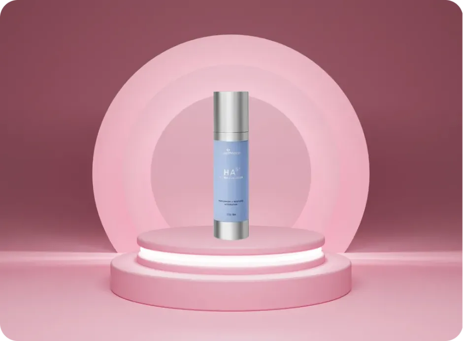 Product shot of skincare bottle on a pink podium, with a pink backdrop circle.