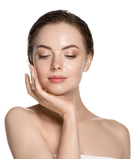 Woman with fair skin touches her face with a hand, eyes closed, against a white background.
