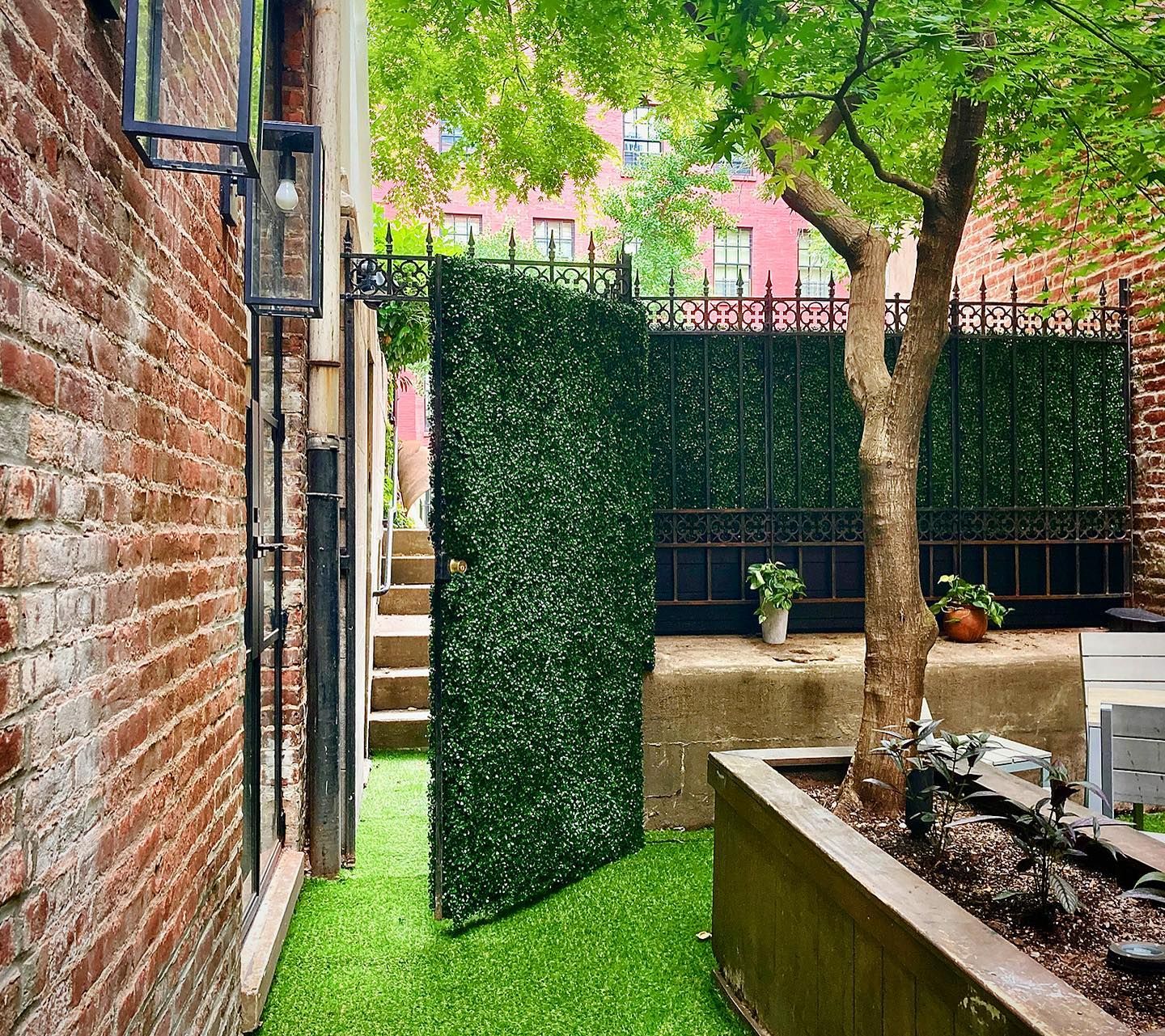 Artificial hedges, custom design, artificial boxwood, artificial plants, planters, custom planters, privacy hedges.