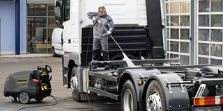 Cleaning The Truck With Pressure Washer — Albany, OR — Sure-Clean NW Cleaning The Truck With Pressure Washer — Albany, OR — Sure-Clean NW