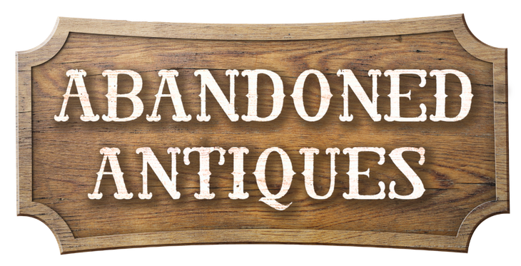 A wooden sign that says abandoned antiques on it