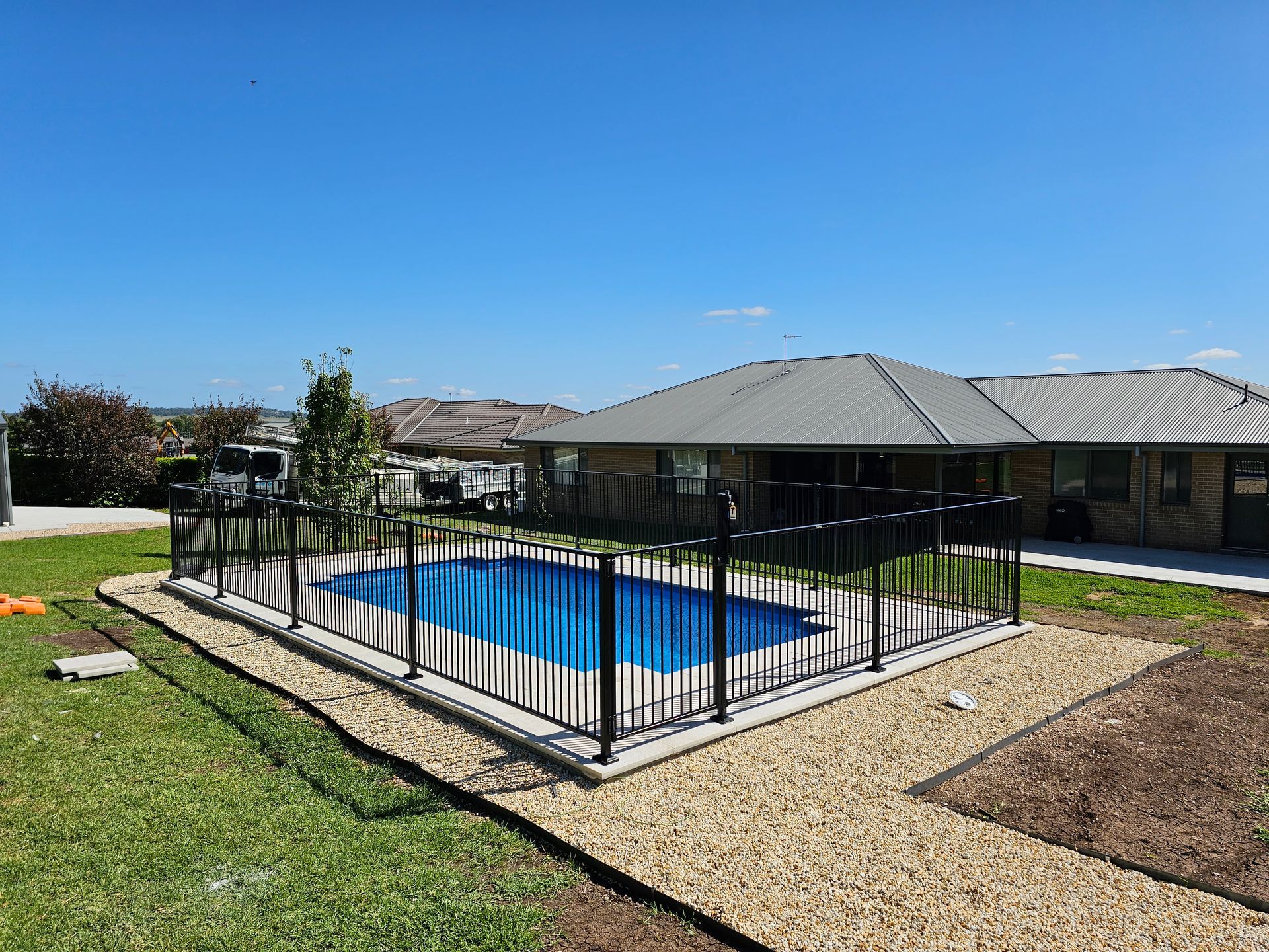 Fibreglass Pool Fence — Pool Builder in Moore Creek, NSW