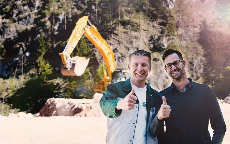 Mitarbeiter vor einer Baustelle von der Firma SSK Salzburger Sand und Kieswerke