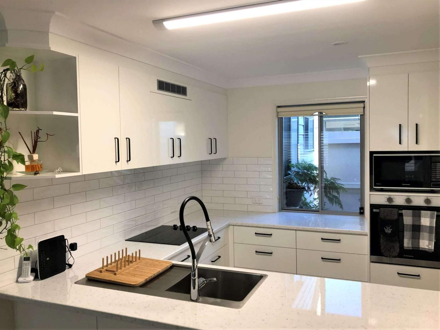 All White Cabinet Kitchen — Nyblad Construction in Caloundra West, QLD