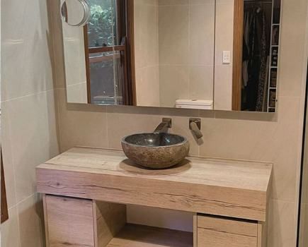 A Wooden  Bathroom With A Sink — Nyblad Construction in Caloundra West, QLD