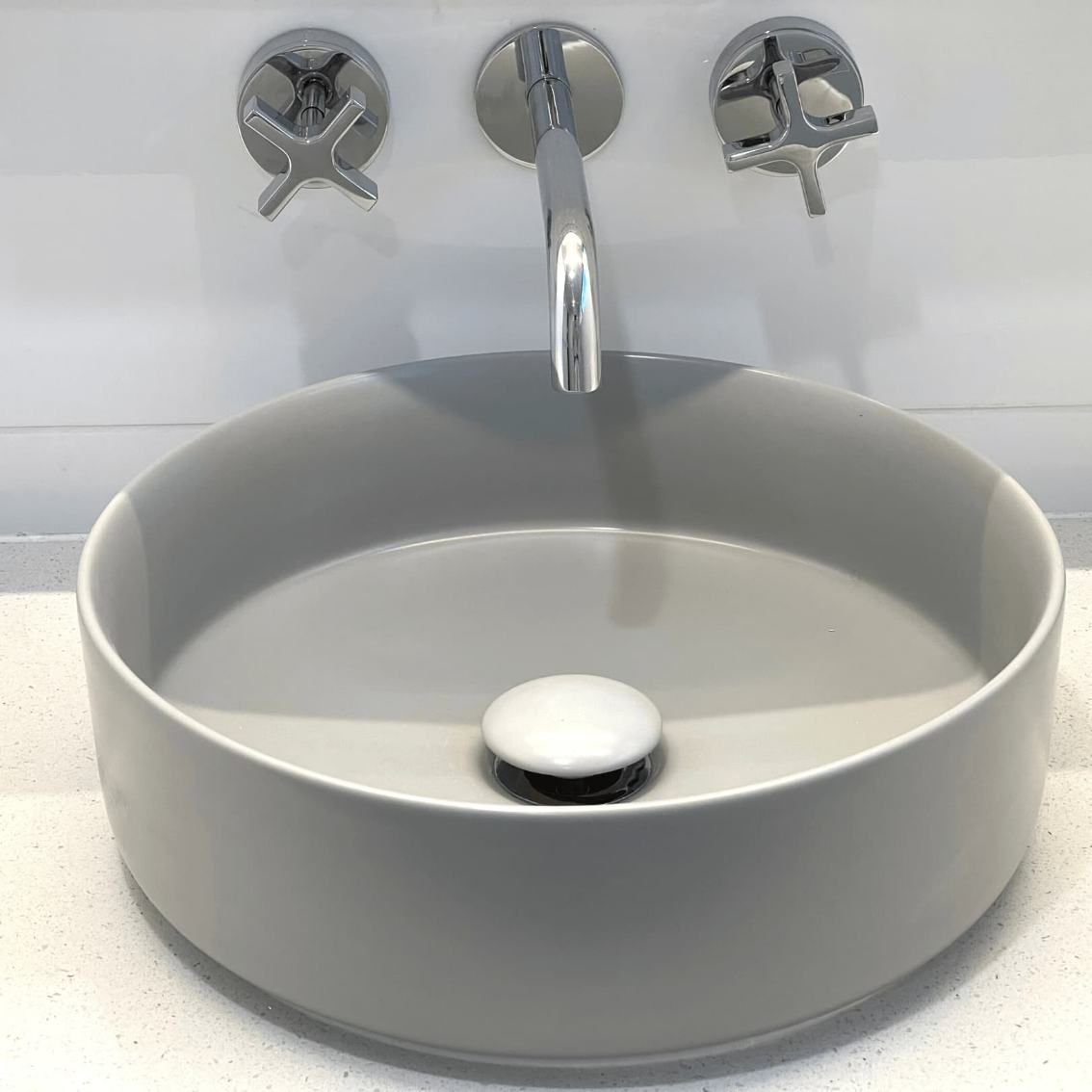 A Bathroom Sink With Three Faucets And A Drain — Nyblad Construction in Caloundra West, QLD