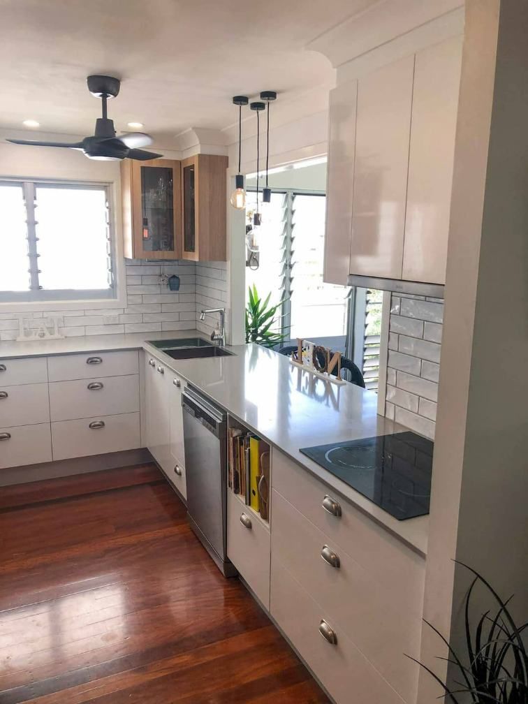 New Finish Kitchen With Wooden Floor — Nyblad Construction in Caloundra West, QLD