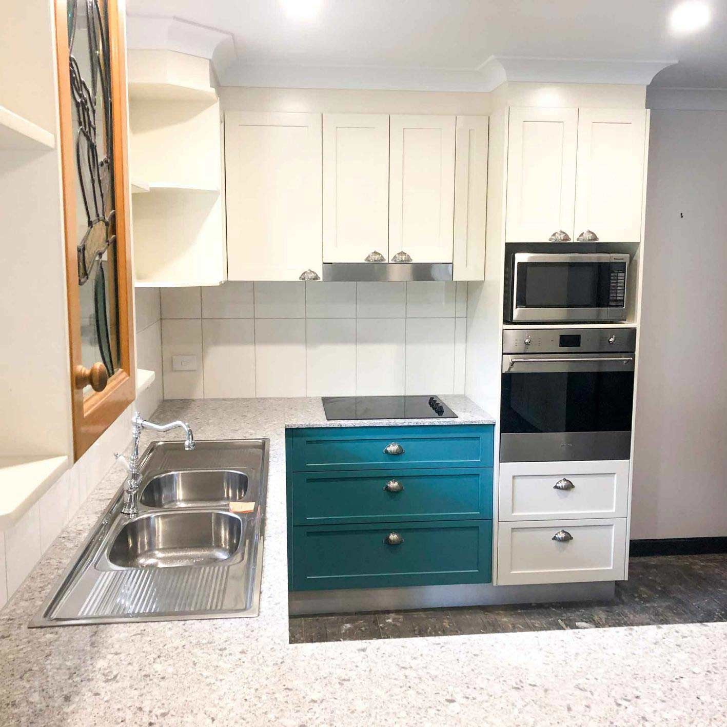  Modern Kitchen With A Microwave And Two Sinks — Nyblad Construction in Caloundra West, QLD