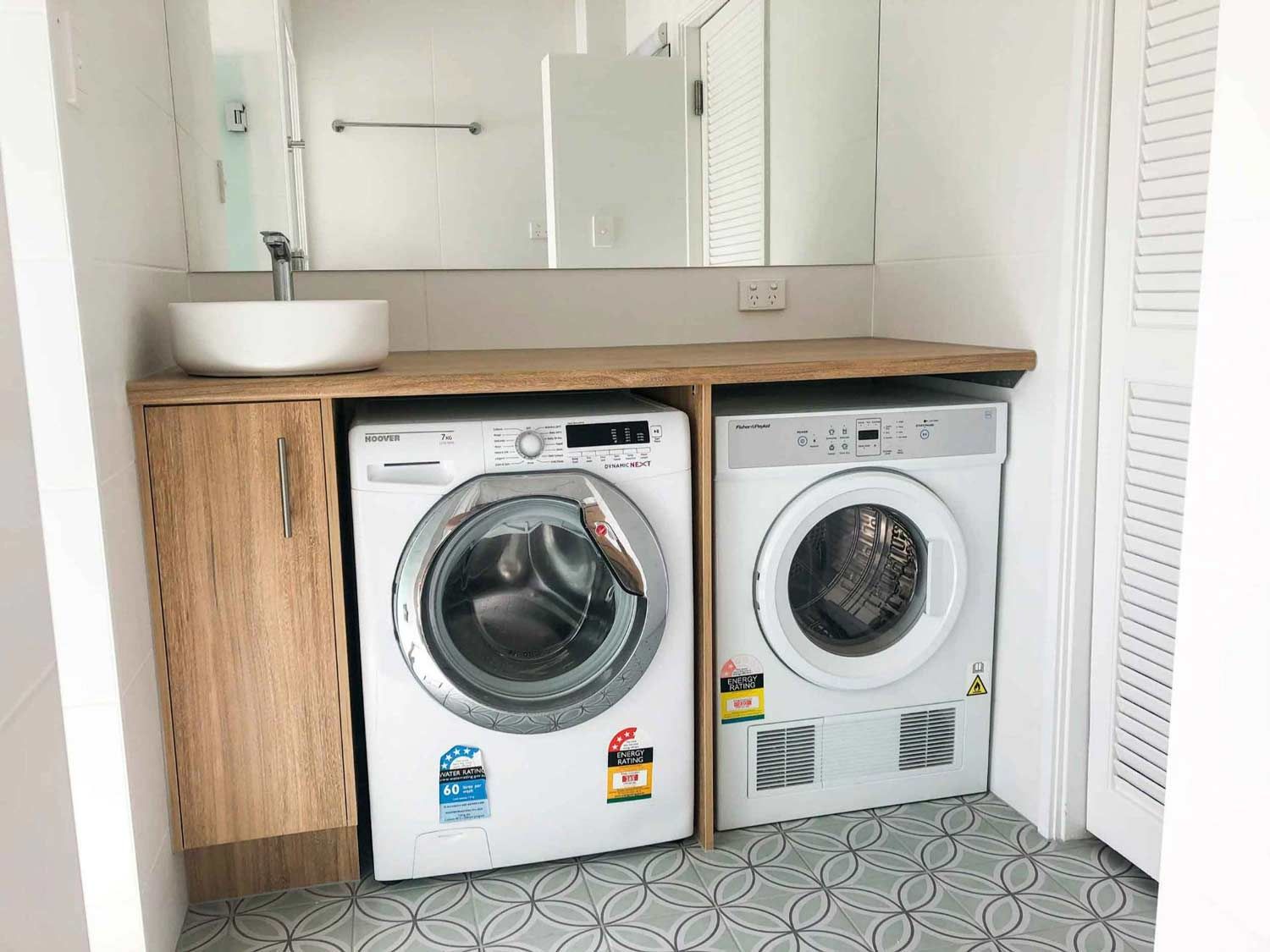 A Bathroom With Two Washer And Dryer  — Nyblad Construction in Caloundra West, QLD