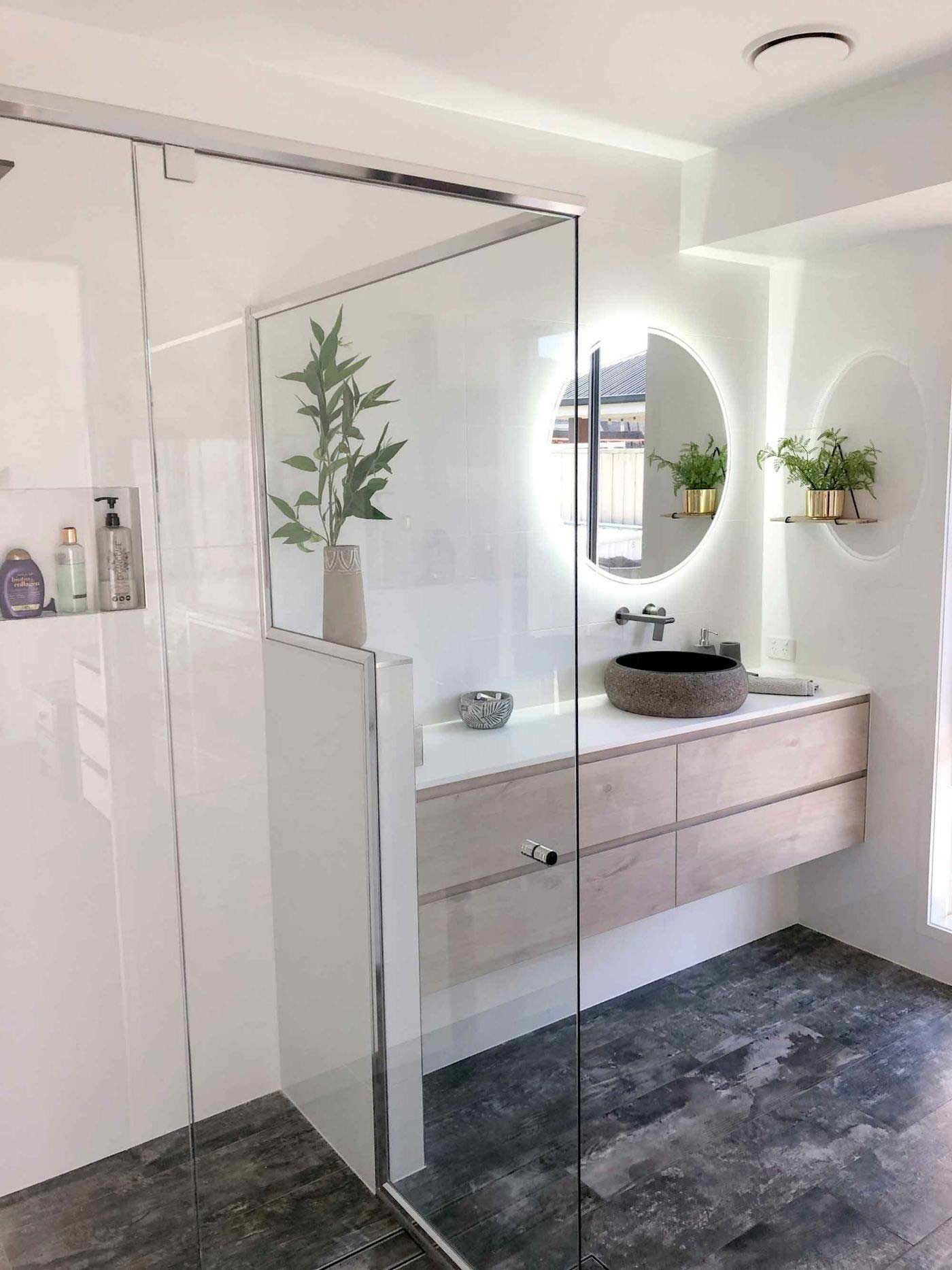 Bathroom With Sliding Glass Window Shower Glass Area — Nyblad Construction in Caloundra West, QLD