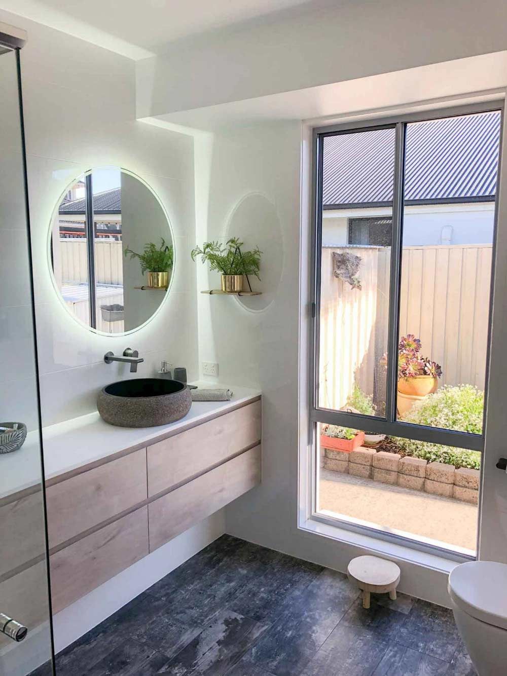 Bathroom With Sliding Glass Window — Nyblad Construction in Caloundra West, QLD