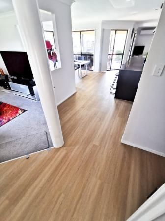 Hallway Of Luxury Home With Wooden Floors — Nyblad Construction in Caloundra West, QLD