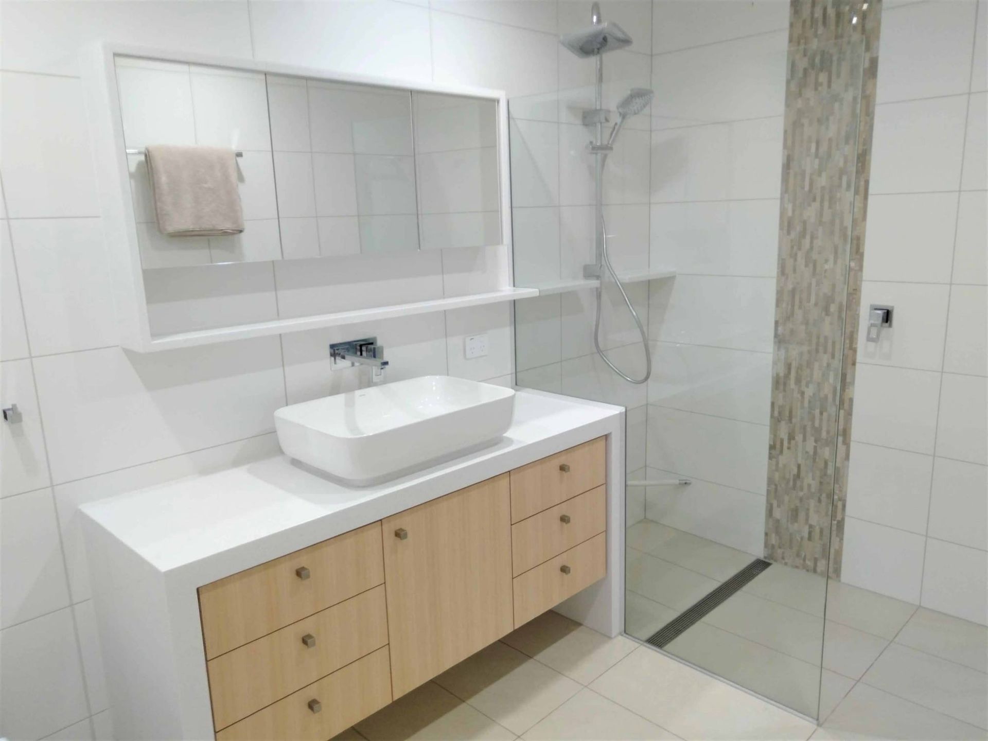 Bathroom With Wooden And Marble White Countertop Cabinet — Nyblad Construction in Caloundra West, QLD