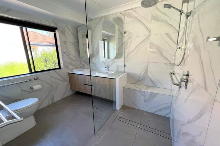 Elegant Bathroom Renovation With Shower And Toilet — Nyblad Construction in Caloundra West, QLD