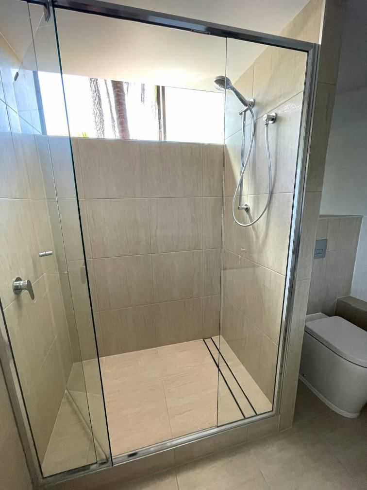 Large Shower Glass Screen In The Bathroom — Nyblad Construction in Caloundra West, QLD