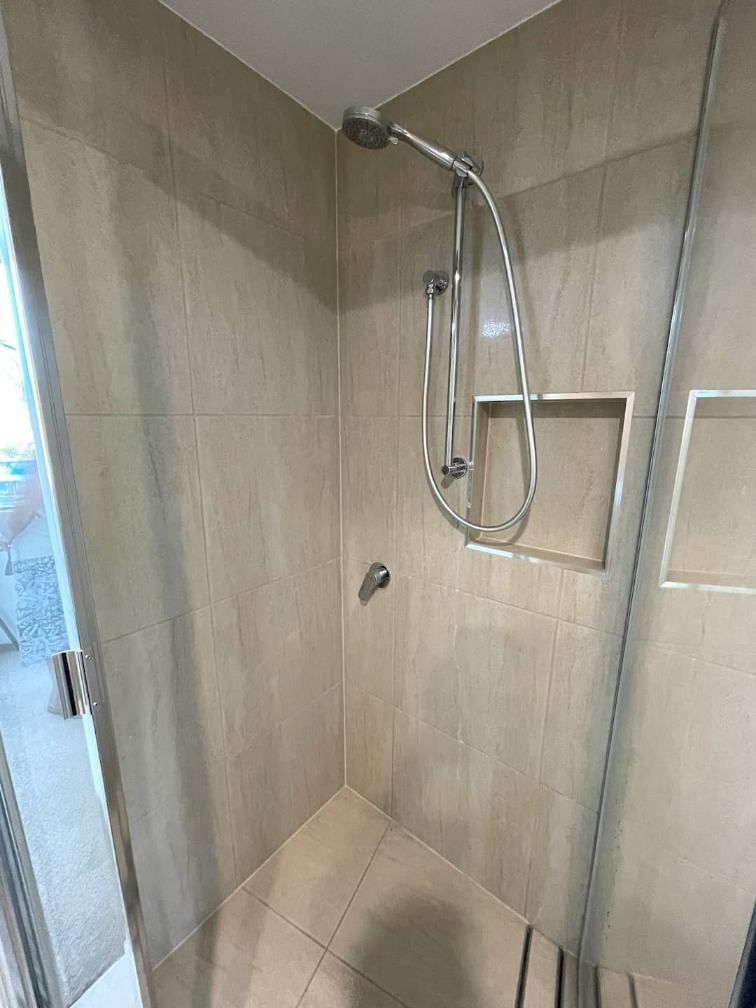 A Bathroom Shower Head — Nyblad Construction in Caloundra West, QLD