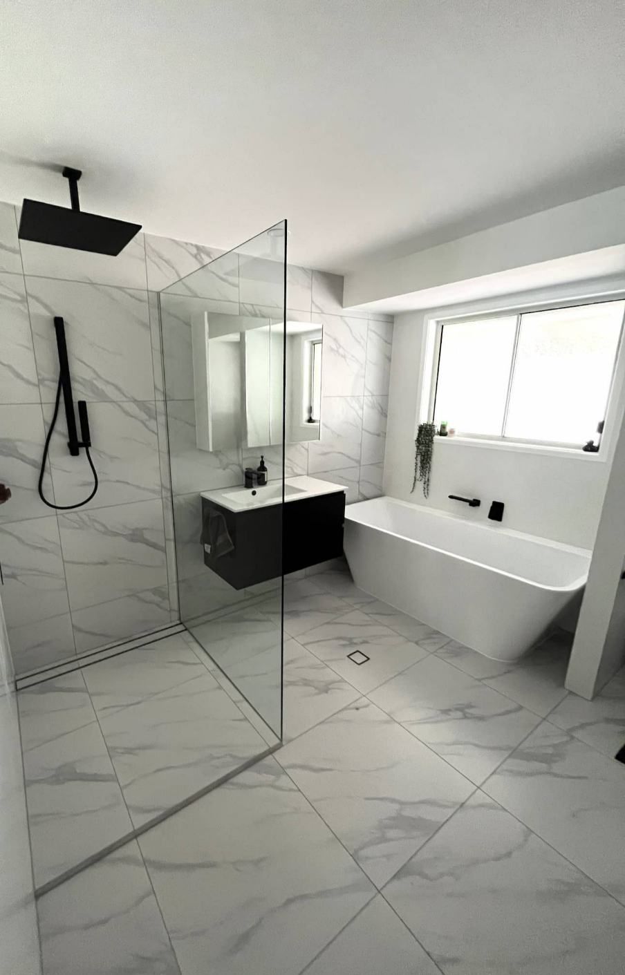 A Bathroom With A Bathtub — Nyblad Construction in Caloundra West, QLD