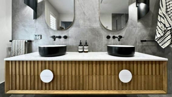 Floating Wooden Cabinet And Two Bathroom Sinks And Large Mirror Front View — Nyblad Construction in Caloundra West, QLD