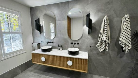 Floating Wooden Cabinet And Two Bathroom Sink And Large Mirror — Nyblad Construction in Caloundra West, QLD