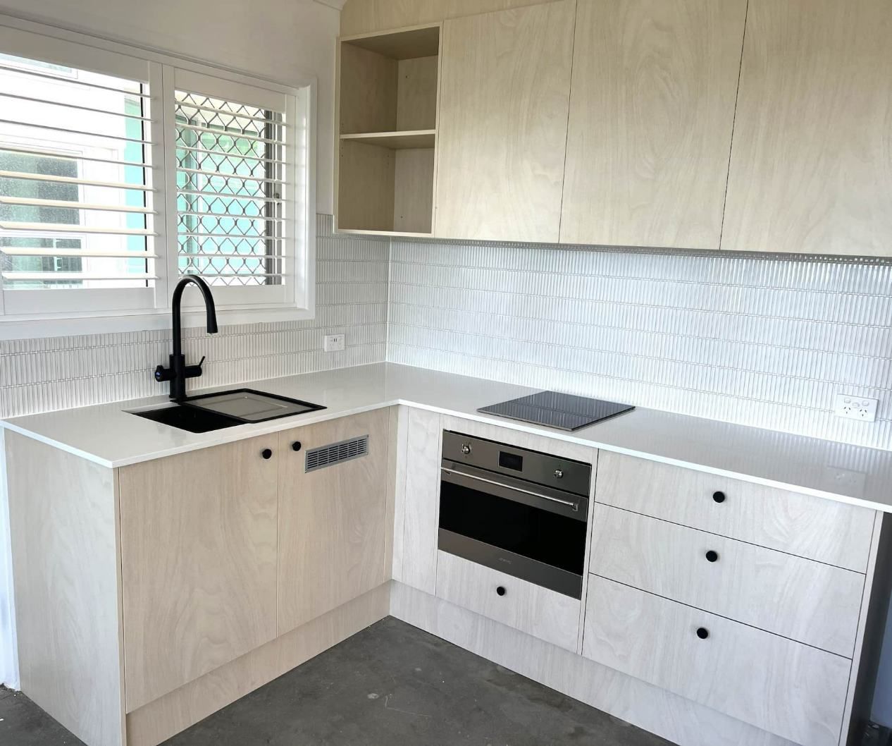 Black and White Kitchen Design — Nyblad Construction in Caloundra West, QLD