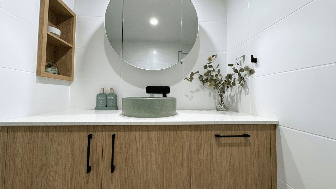 A Bathroom Cabinet With Big Mirror On The Wall — Nyblad Construction in Caloundra West, QLD