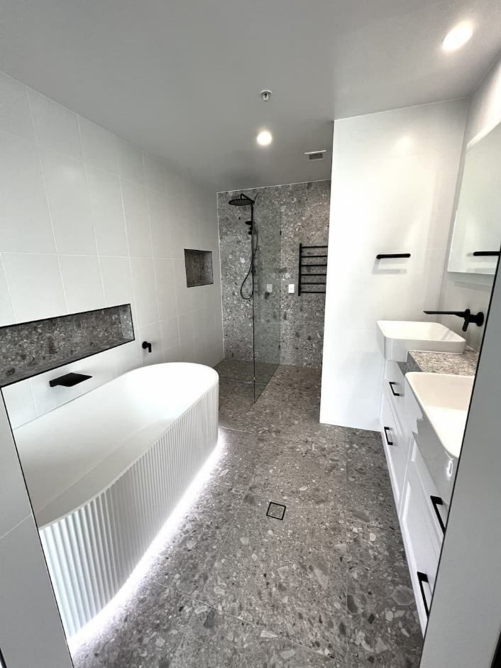 A Bathroom Equipped With A Bathtub  — Nyblad Construction in Caloundra West, QLD