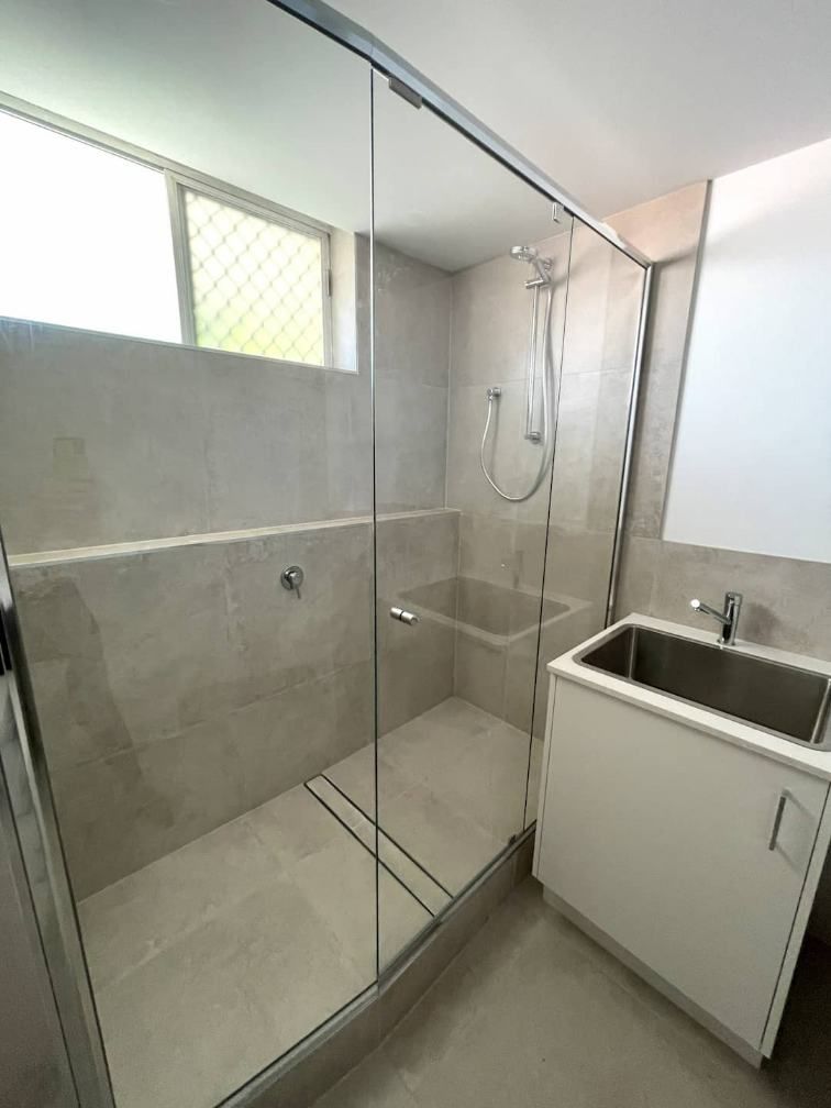 A Cozy Bathroom With Shower Glass — Nyblad Construction in Caloundra West, QLD