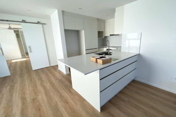 There Is A Large Island In The Middle Of The Kitchen — Nyblad Construction in Caloundra West, QLD