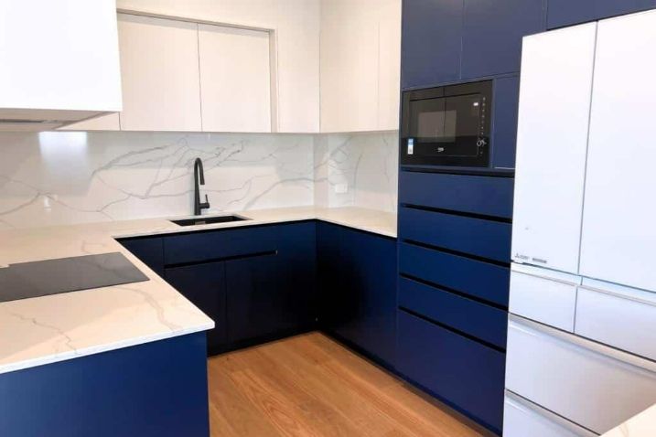 Modern Kitchen  With Blue Cabinet — Nyblad Construction in Caloundra West, QLD