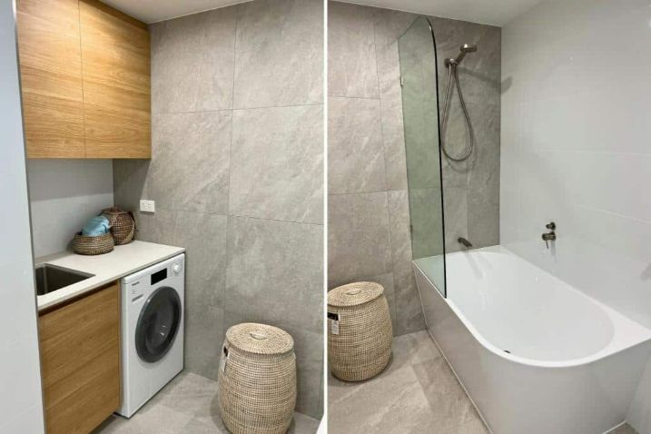 A Bathroom With A Washer And Dryer And A Bathtub — Nyblad Construction in Caloundra West, QLD