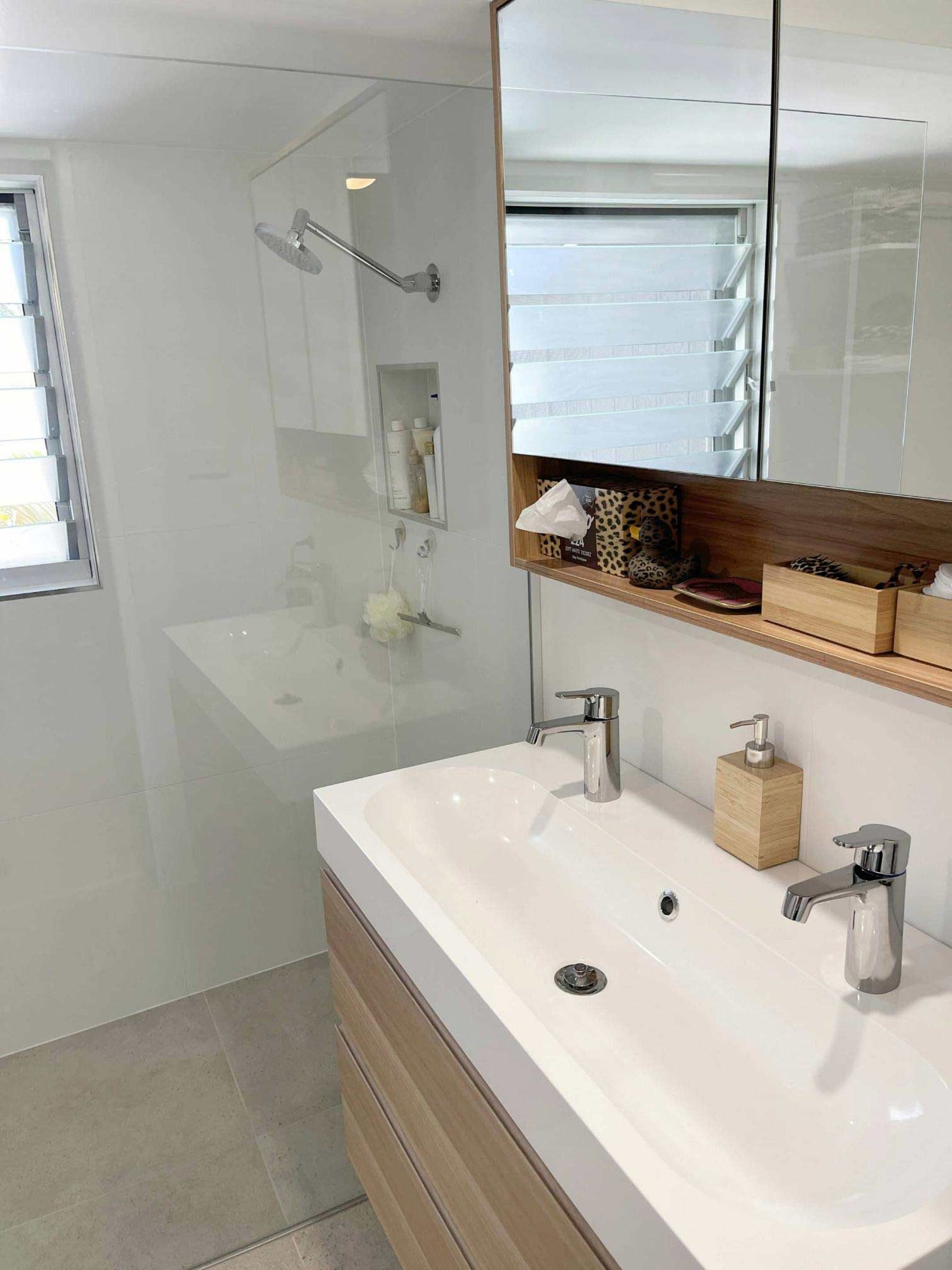 A Silver Tap In A White Bathroom — Nyblad Construction in Caloundra West, QLD