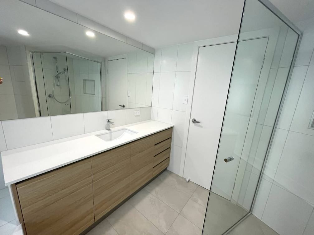 Clean, Modern Bathroom With Refreshing Shower — Nyblad Construction in Caloundra West, QLD