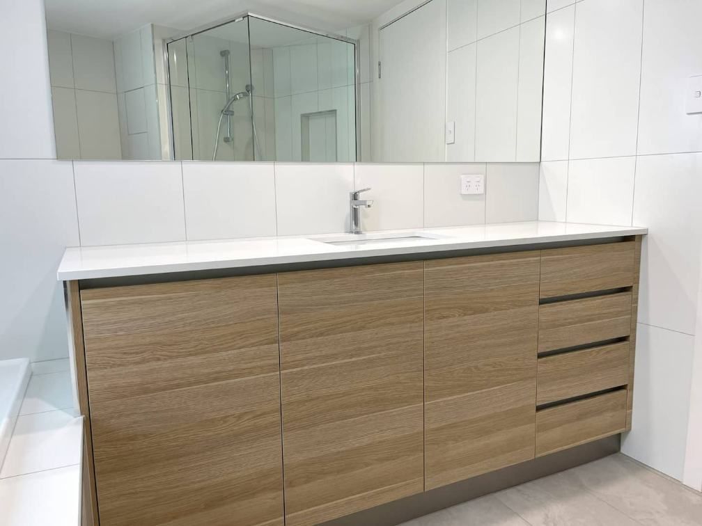 Close Up Of The Wooden Bathroom Cabinet — Nyblad Construction in Caloundra West, QLD